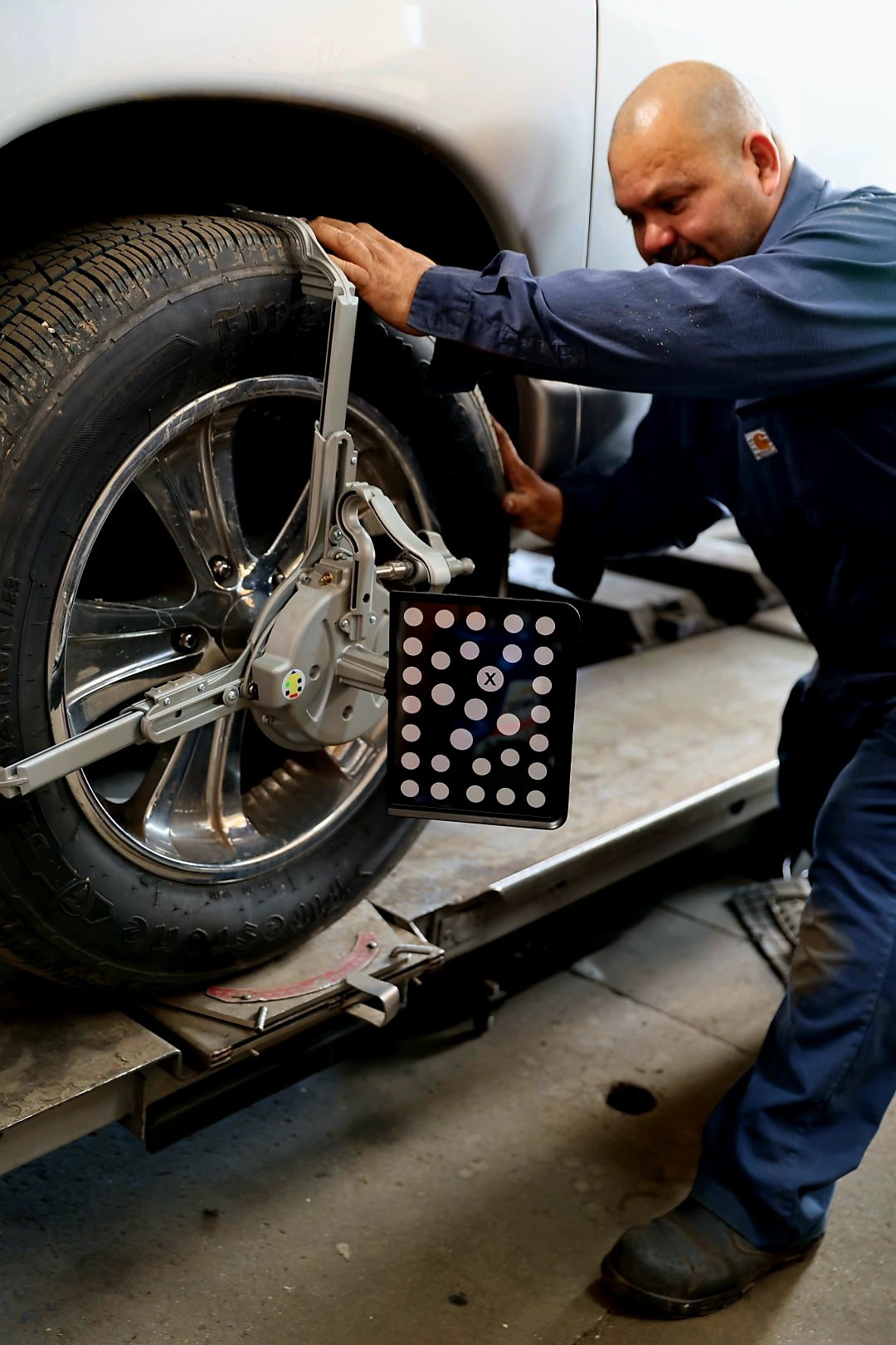 Auto technician working on truck